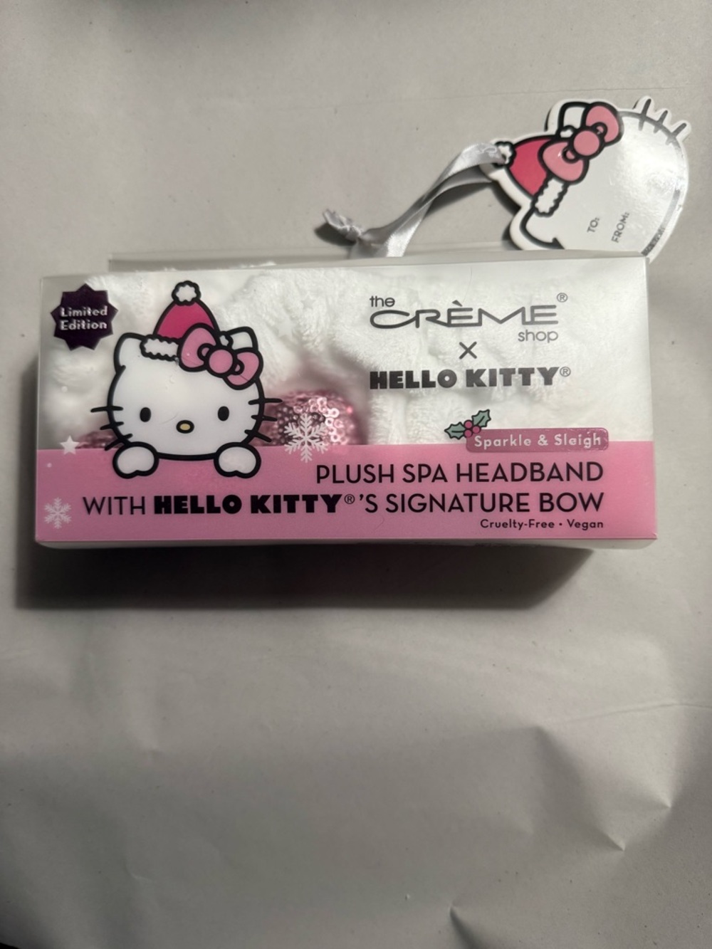 The Crème X Hello Kitty Pink & White Plush Spa Headband